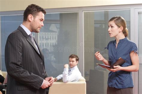 Young Secretary Talking To Her Boss In The Office Stock Image Image