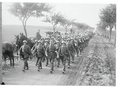 Soldiers Marching In Formation Photograph By Bettmann