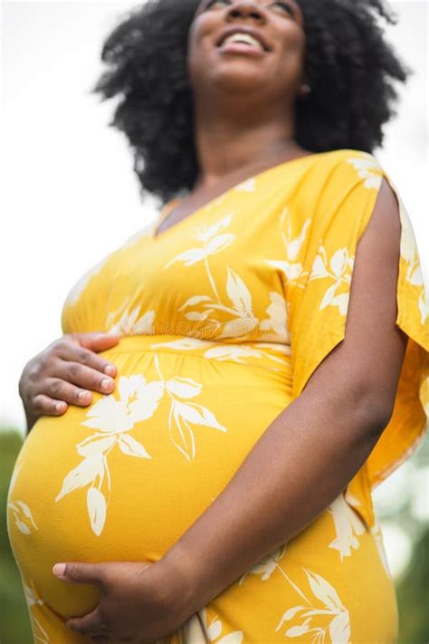 Portrait Of A Beautiful African American Pregnant Woman Stock Image