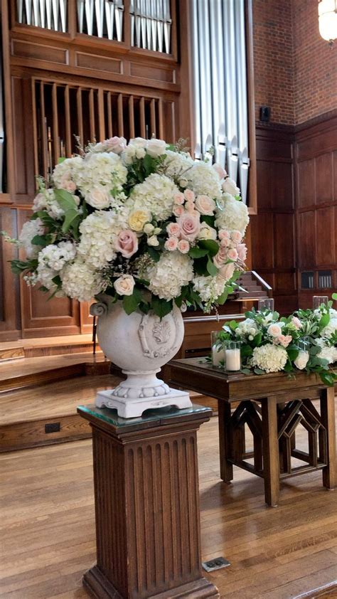 Other flowers might be included, such as altar flowers, cake flowers, or a flower crown. Lush wedding flowers for ceremony. This wedding was at ...