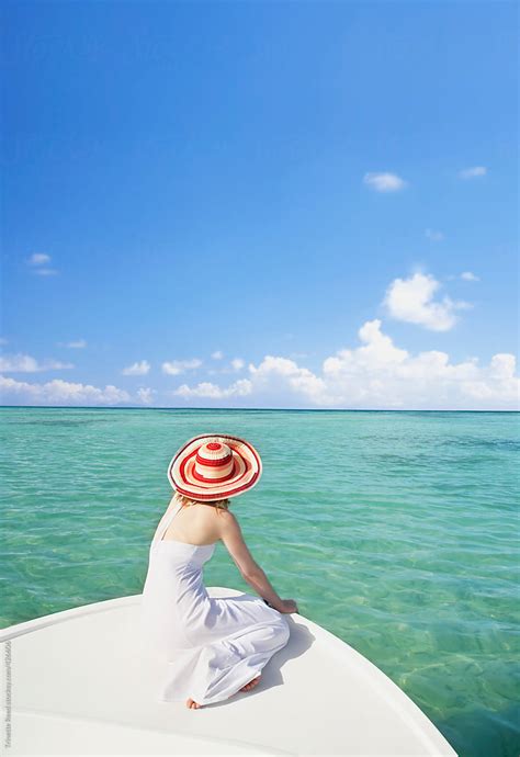 Woman Relaxing On Boat In The Caribbean By Stocksy Contributor