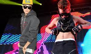 Justin Bieber Flashes His Abs Onstage At Jingle Ball After Grabbing His Crotch On The Red