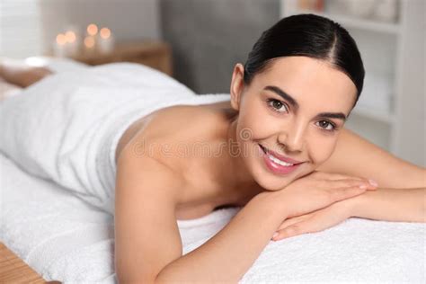 Beautiful Happy Woman Relaxing On Massage Table In Spa Salon Stock Image Image Of Healthy