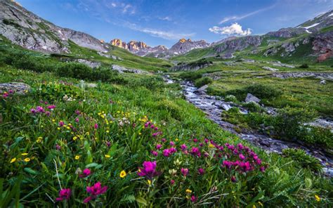 Download Landscape Beautiful Scenery Rocky Peaks Stream Meadow With