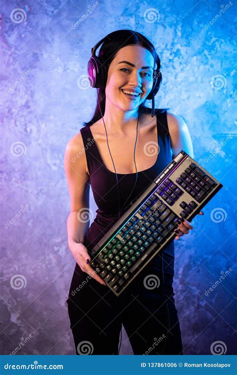 Beautiful Friendly Pro Gamer Streamer Girl Posing With A Keyboard In