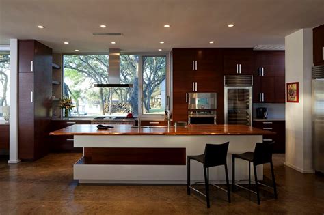 Sleek, glossy white cabinets add a modern touch. 30 Modern Kitchen Design Ideas - The WoW Style