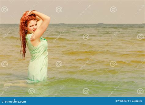 Redhead Woman Posing In Water During Summertime Stock Photo Image Of