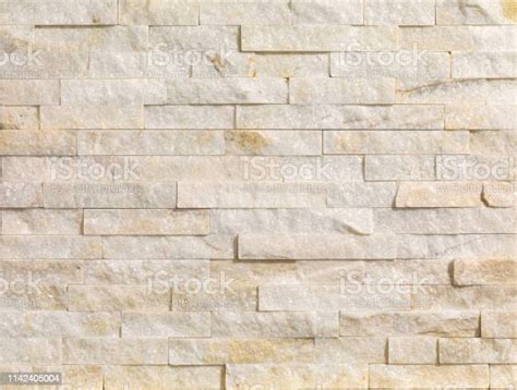 Panel Dinding Batu Krem Dengan Latar Belakang Tekstur Permukaan Kasar