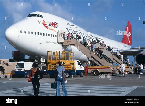 Passengers Boarding A Plane Stock Photo Alamy