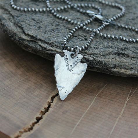 Beautiful pendants in the shape of arrowheads. Men's Personalized Arrowhead Necklace, Fine Silver, Rugged ...