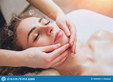 Beautiful Woman In Spa Salon Getting Facial Massage Stock Image Image