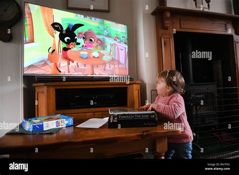 Children Watching Tv Programme Hi Res Stock Photography And Images Alamy