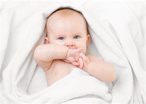 Cute Baby Lying On White Towel And Sucking Own Stock Image Image Of