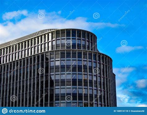 Modern Architectural Building Under A Blue Sky Stock Photo Image Of