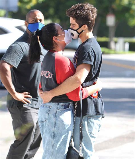 Demi Lovato And Fiancé Max Ehrich Share Kiss Through Masks