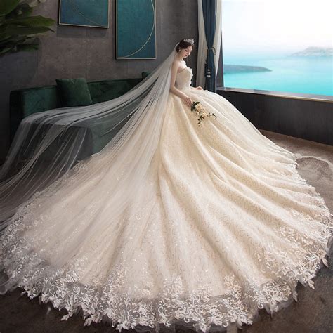 Elegant Strapless Wedding Dress Simple Lace Pearl Decorated Long Tail