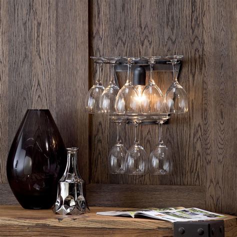 Our living room wall lights or bedroom wall lights are ideal for instilling your environment with soft, relaxing illumination and creating a warming, homely atmosphere. Wine Glass Light - Modern Black Wall Light from Litecraft