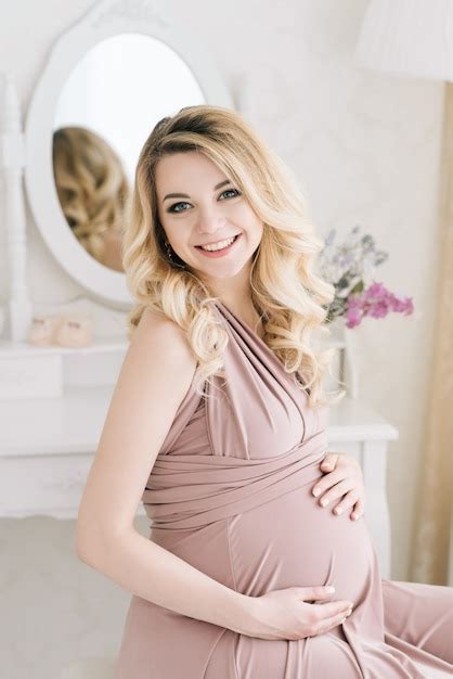 Premium Photo Beautiful Blond Pregnant Woman