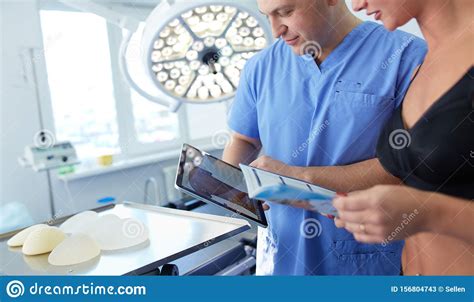 Doctor Showing Young Patient Her Chest In His Office At The Hospital Stock Image Image Of