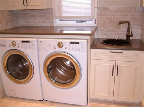 A matching washer and dryer look pretty together but they do not always make a great couple. Simplifying Remodeling: Designer's Touch: 10 Tidy Laundry ...