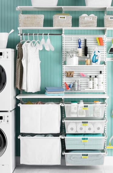 Contemporary laundry room features gray lacquered cabinets by ikea topped with gray and white quartz countertops which resemble marble fitted with a. Beautifully organized laundry room http://rstyle.me/n ...