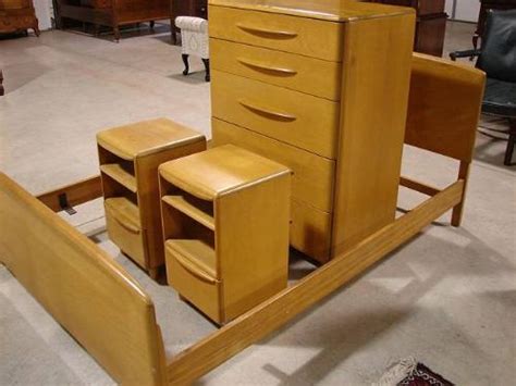 Let's start in the living room. FOUR PIECE HEYWOOD WAKEFIELD BEDROOM SUITE