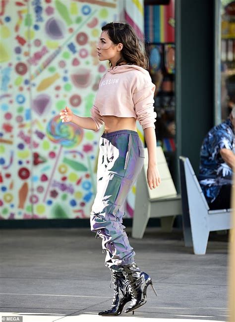 Olivia Culpo Displays Her Rock Hard Abs In Two Sexy Cropped Ensembles As She Steps Out In