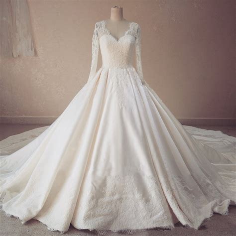 | whether it's a full and bodied tulle, a beautiful textured mikado or luxe satin fabrication, the ball gown. Noble White Ivory Satin Ball Gown Wedding Dresses V Neck Long Sleeve Bridal Dresses Applique ...