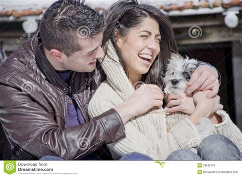 Portrait Of A Young Love Couple And Their Dog Stock Image Image Of