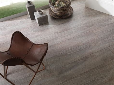 If you want your living room to look cosy and elegant with a glossy or matte finish, you can easily achieve both with the right laminate flooring. Porcelanosa Laminate Roble Vancouver - Modern - Laminate ...
