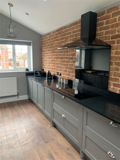 So white is tending to lose its moment. Kitchen | Open plan kitchen dining living, Brick slips ...