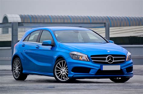 Photography Of A Blue Mercedes Benz 5 Door Hatchback · Free Stock Photo