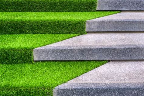 Roll out your fake grass onto the tiled area. How and Why You Should Lay Artificial Grass on Concrete - Blog