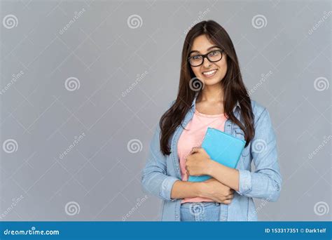 Happy Indian Girl Student In Glasses Hold Book Isolate Grey Background
