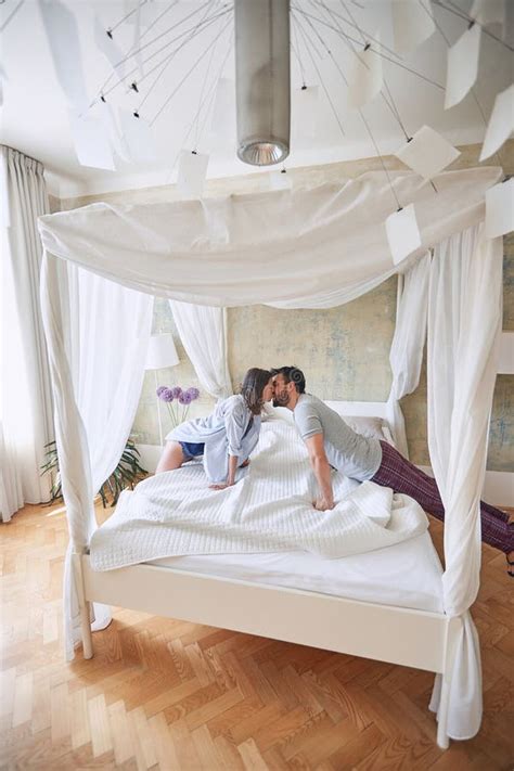 Couple Kissing In The Morning While Making Bed Fresh Morning Couple Togetherness Concept