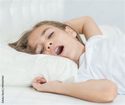 Close Up Little Girl Sleeping With Her Mouth Open Snoring Stock Photo