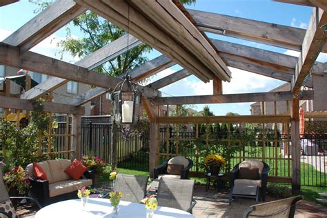 You can entertain, celebrate special family events, or simply relax on your newly the herald's front gutter and hidden rubber gasket helps direct rain and snow off to the sides, keeping your entrance clear. Pitched Retractable Canopy in Oakville | ShadeFX Canopies