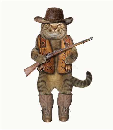 Vaquero Del Gato Con Un Rifle En El Rancho Imagen De Archivo Imagen