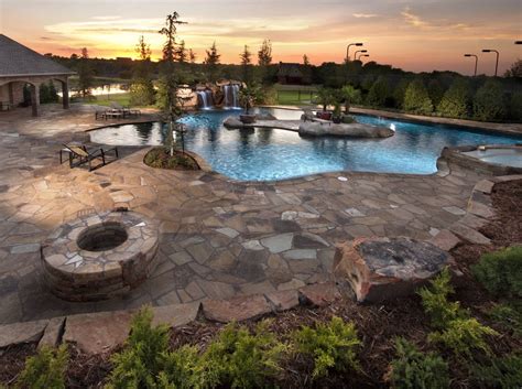20,602 views, added to favorites 964 times. Glass Tiled Pool With A Rustic Island Oasis in Oklahoma ...
