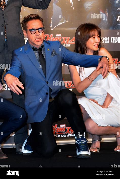Actor Robert Downey Jrl And Korean Actress Claudia Kim Attend A