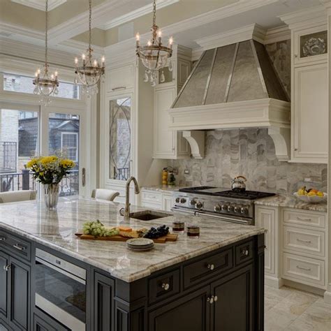 The kitchen is very spacious, including a large cooking area, big benched table and a very useful pantry room. Traditional Kitchen Design - Drury Design