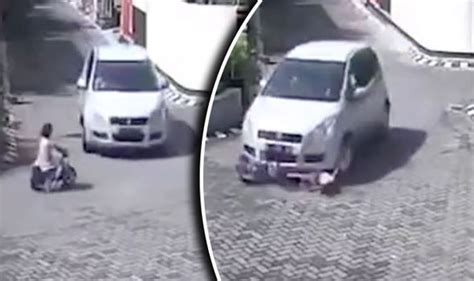 Girl Miraculously Survived After Being Crushed Under Front Wheel Of Car