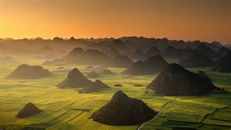 Morning Light Over Luoping Yunnan China © Nutexzlesgetty Images