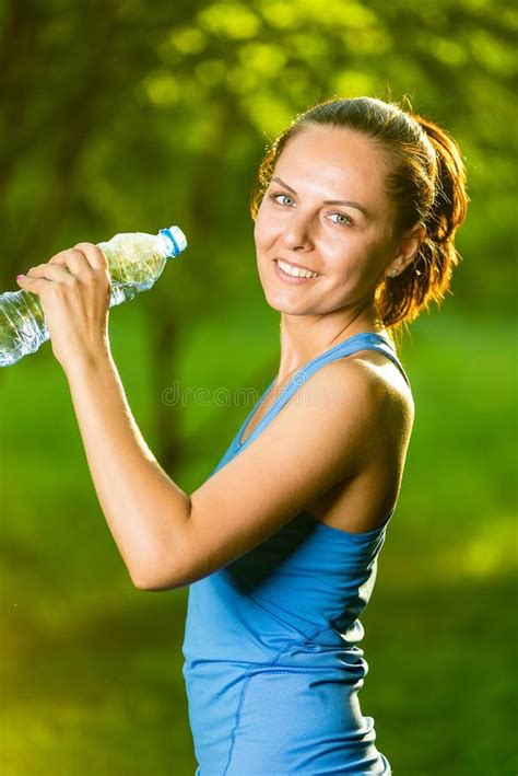 Young Woman Drinking Water After Fitness Exercise Stock Photo Image