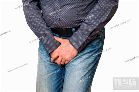 Man With Hands Holding His Crotch He Wants To Pee Isolated On White