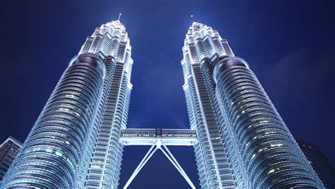 Petronas twin towers are the tallest twin towers in the world, and its status has remained unchallenged since 1996. KUALA LUMPUR - APRIL 26 : The Petronas Twin Towers (KLCC ...