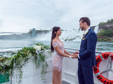 Groom Reciting His Vows Under Niagara Falls Joshbellinghamphotography
