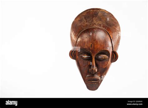 Traditional African Wooden Mask On A White Background Stock Photo Alamy