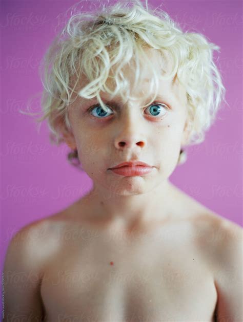 Portrait Of Blonde Boy Aggainst Purple By Stocksy Contributor Wendy