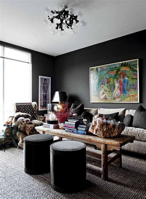A Living Room Filled With Furniture And A Painting On The Wall Next To